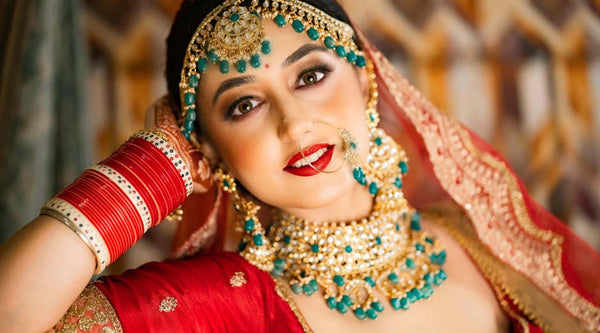 Elegant woman showcasing jewelry and style tips for how to accessorize a lehenga