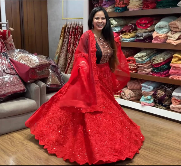 Priyanka Nayak lehenga journey showcasing vibrant red lehenga with intricate designs in JMS Studio