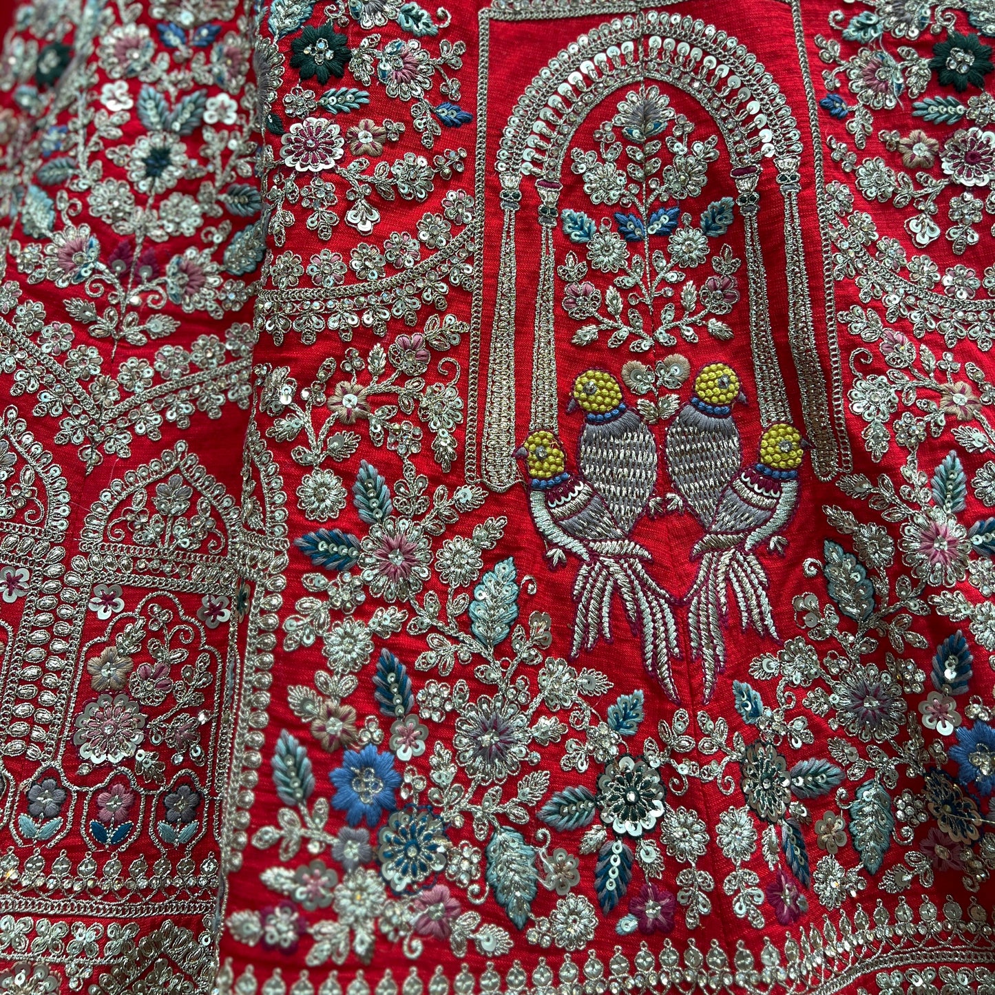 Dulhan in Red Lehenga Elegance: Raw Silk Royal Red Bridal Lehenga JMS Studio {{ Royal Red Bridal Lehenga}}