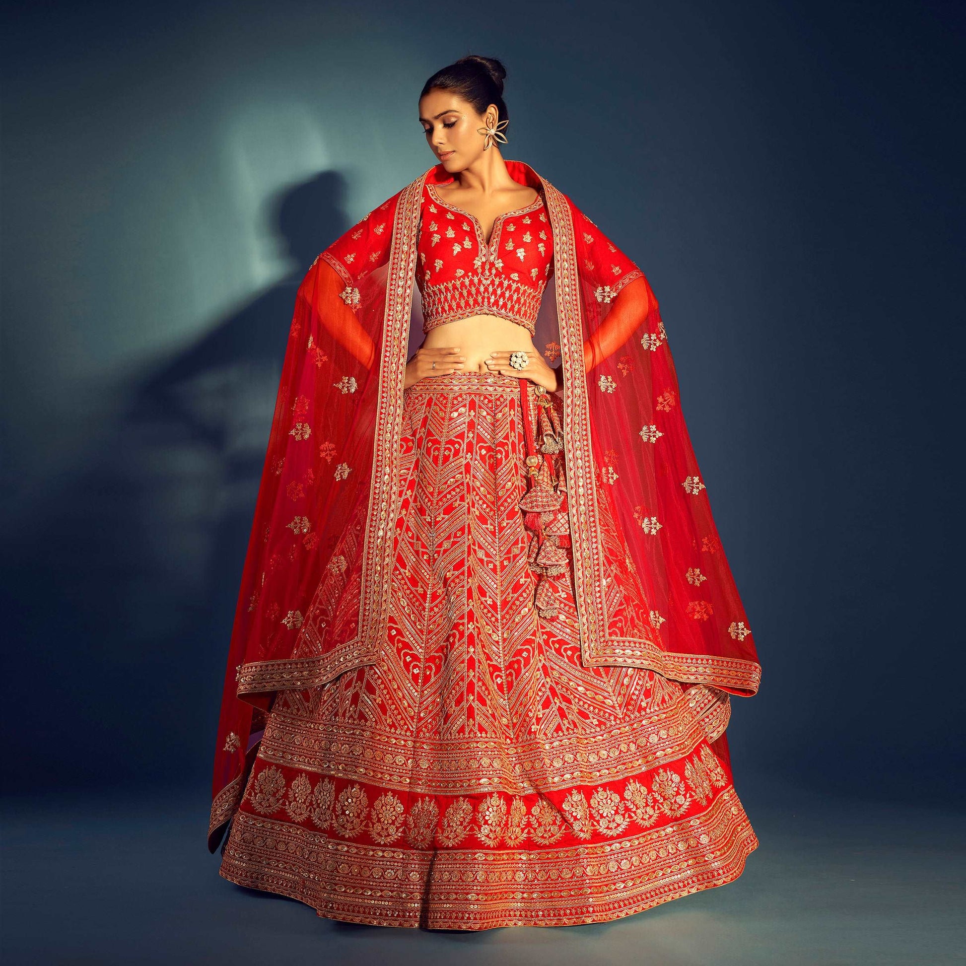 Dulhan in Red Lehenga Elegance: Sabyasachi-Inspired Royal Baggi Collection JMS Studio {{ Royal Red Bridal Lehenga}}