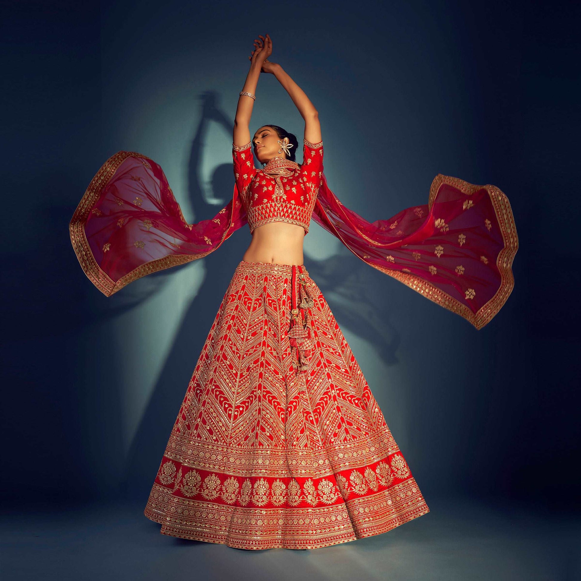 Dulhan in Red Lehenga Elegance: Sabyasachi-Inspired Royal Baggi Collection JMS Studio {{ Royal Red Bridal Lehenga}}