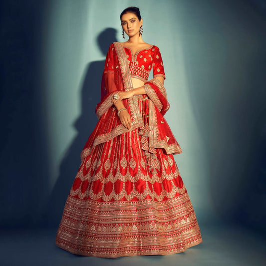 Dulhan in Red Lehenga Elegance: Sabyasachi-Inspired Royal Baggi Collection JMS Studio {{ Royal Red Bridal Lehenga}}