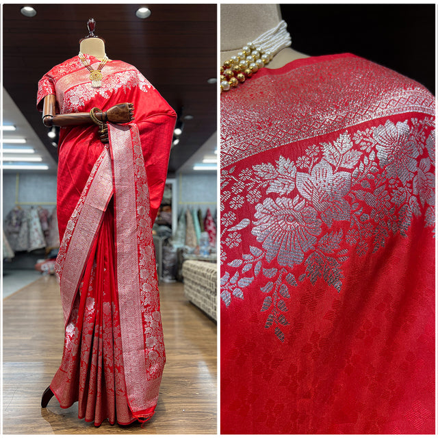 Red Kanjivaram-style saree with gold zari floral weave and wide border