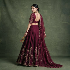 Wine lehenga skirt with pleats, gold embroidered choli, and matching sheer dupatta