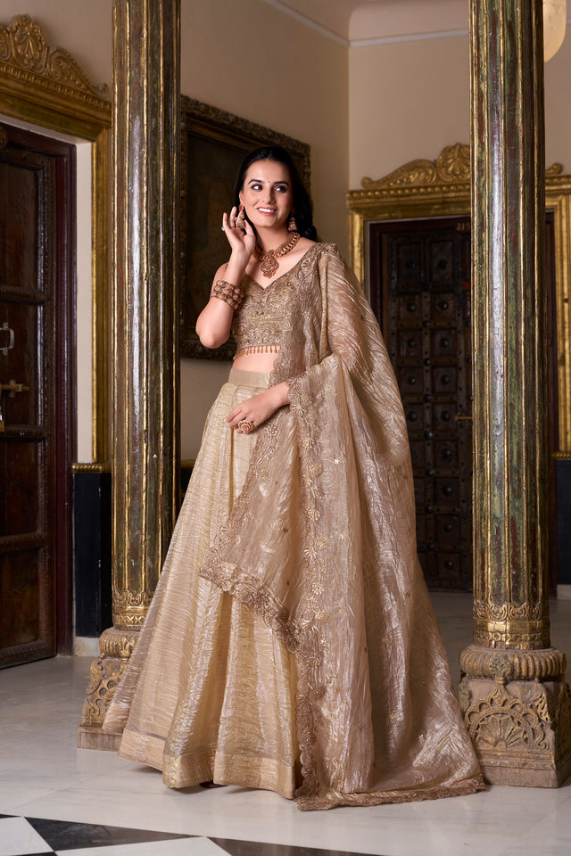 Doli beige sequined lehenga choli set with thread embroidery, full skirt flare