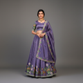 Lavender lehenga choli set with gold sequins and floral border; ornate hem motifs