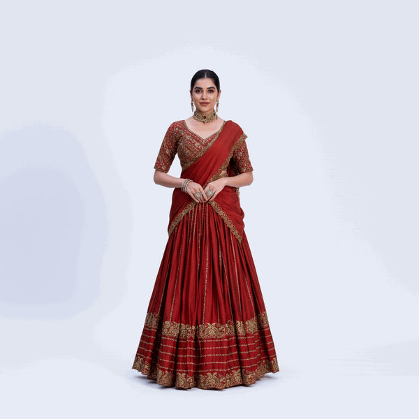 Women's maroon lehenga choli set with gold sequin and thread embroidery, short sleeves