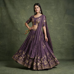 Doli lavender lehenga with gold zari embroidered hem border and dupatta