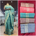 Art silk saree in teal with golden woven border and patterned pallu; draped on mannequin