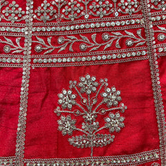 Red raw silk bodice panel with silver floral embroidery and layered chain borders