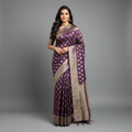 Purple Kanjivaram-style saree with gold zari border and patterned pallu