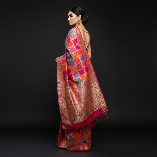 Silk saree with maroon, orange, and blue patchwork and gold zari border