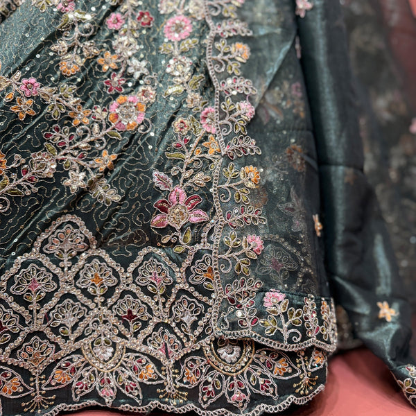 Embroidered bottle green organza lehenga border with colorful resham and zari floral motifs