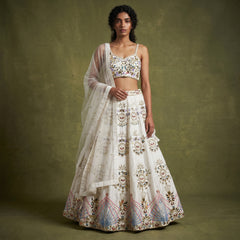 White raw silk lehenga with mirror & bead embroidery border, sheer dupatta