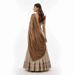 Doli - Jacquard Silk Zari Weaving Work OffWhite Gold Lehenga Choli set