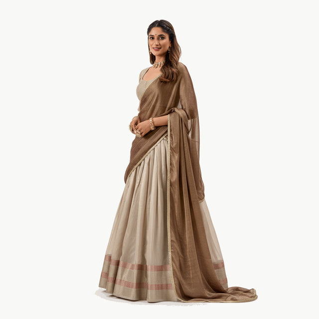Off-white silk lehenga skirt with mocha dupatta and striped border