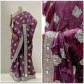 Purple silk partywear saree with silver stonework motifs and ornate pallu border
