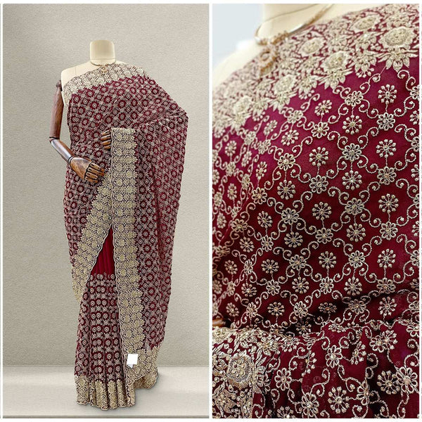 Designer georgette party saree in maroon with gold floral stonework pattern