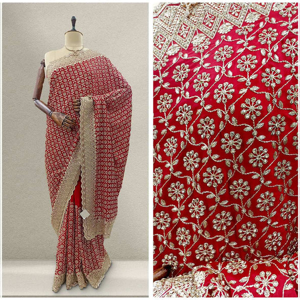 Red georgette saree with gold and white floral embroidery and beige border