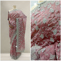 Embroidered silk partywear saree in mauve with silver stone floral motifs and border