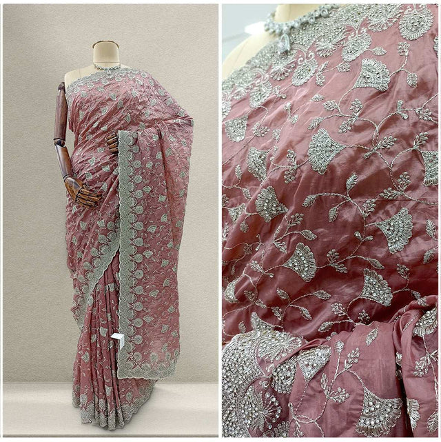 Embroidered silk partywear saree in mauve with silver stone floral motifs and border