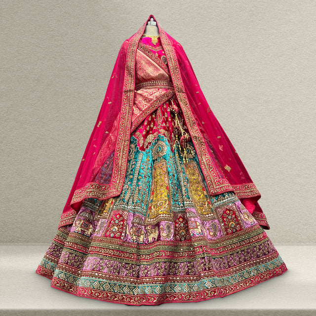 Multicolor patchwork bridal lehenga with tiered skirt and ornate embroidered borders