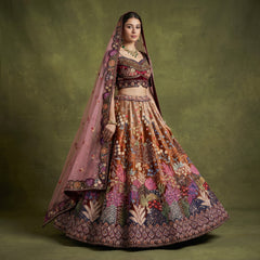 Multicolor velvet lehenga with embroidered blouse and sheer dupatta