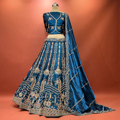 Padmini blue embroidered tissue silk lehenga set with matching dupatta and blouse