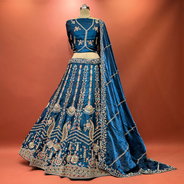 Padmini blue embroidered tissue silk lehenga set with matching dupatta and blouse