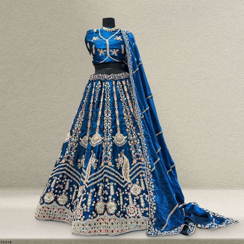Blue embroidered lehenga skirt with full flare, ornate hem border and matching dupatta