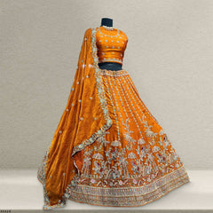 Orange lehenga skirt with dense zari and beadwork details, flared with embroidered edge