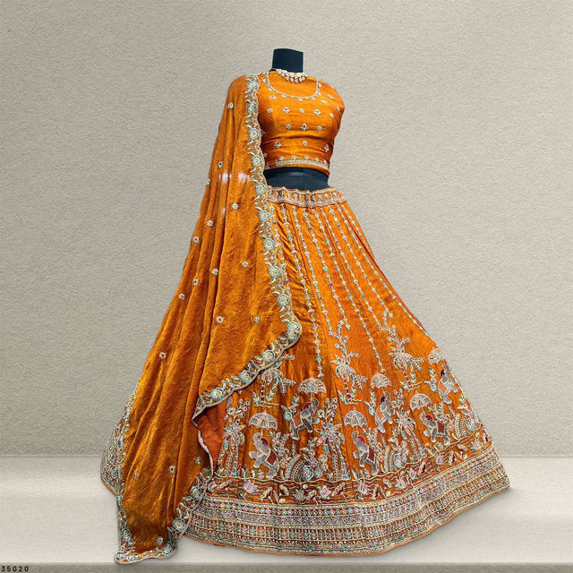 Orange lehenga skirt with dense zari and beadwork details, flared with embroidered edge