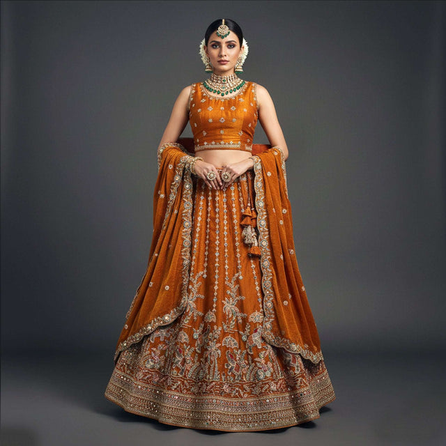 Orange tissue silk lehenga with zari embroidery and embroidered border, full flare skirt