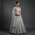 Grey embellished lehenga set with peacock motif crop blouse, flared skirt, sheer dupatta