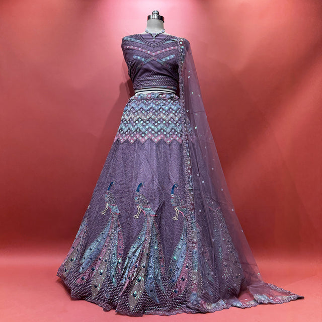 Mauve peacock motif lehenga with matching net dupatta and fully embellished flare
