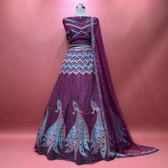 Butterfly wine net peacock motif lehenga with sequined skirt and sheer dupatta