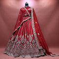 Red bridal lehenga with silver embroidered border and double dupatta