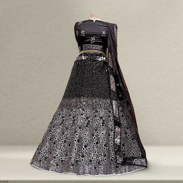 Black sequined lehenga set with silver floral embroidery and matching dupatta