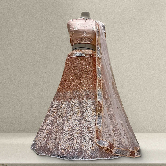 Sequined lehenga with floral lace pattern and sheer peach dupatta