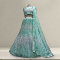 Mint green sequined net lehenga with blouse and matching dupatta