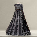 Black sequin embroidered lehenga with matching short-sleeve blouse and flared skirt