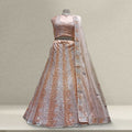 Peach and silver sequin embroidered lehenga with draped sheer dupatta