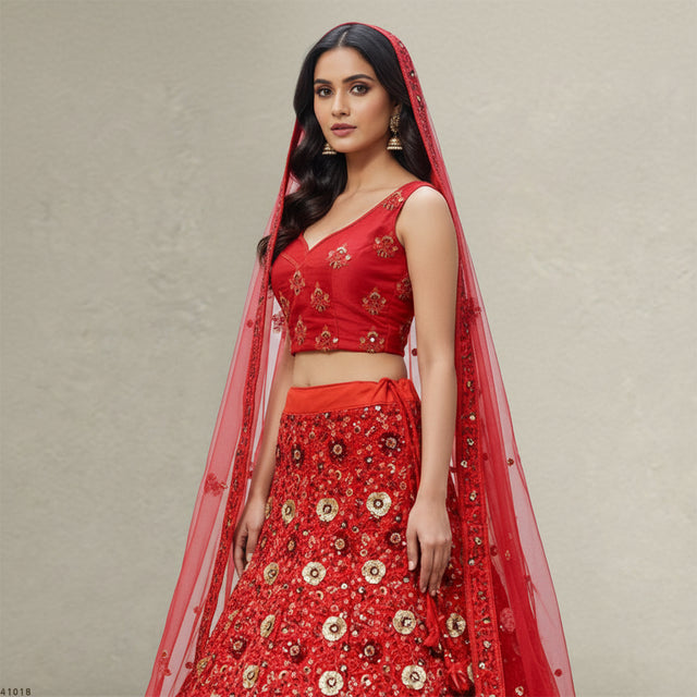 Red embroidered crop-top and lehenga skirt with sequin work, net dupatta