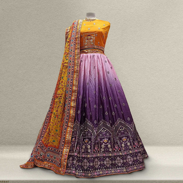 Multicolor silk work lehenga skirt with purple yoke panel and ornate border