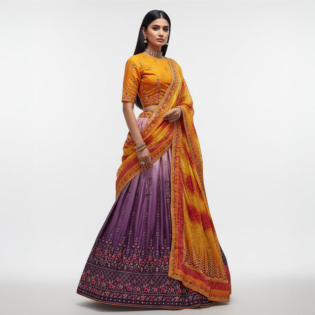 Orange short-sleeve blouse with purple flared lehenga and patterned multicolor dupatta