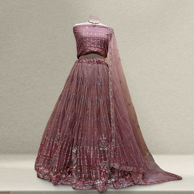 Cinnamon-pink embroidered flared lehenga with matching blouse and sheer dupatta