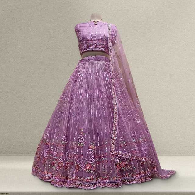 Lightweight pink lehenga skirt with embroidered border and flared pleats
