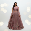 Cinnamon-pink sequined flared lehenga set with sheer dupatta, full skirt flare