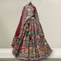 Maroon velvet lehenga with multicolor embroidered dupatta and flared skirt