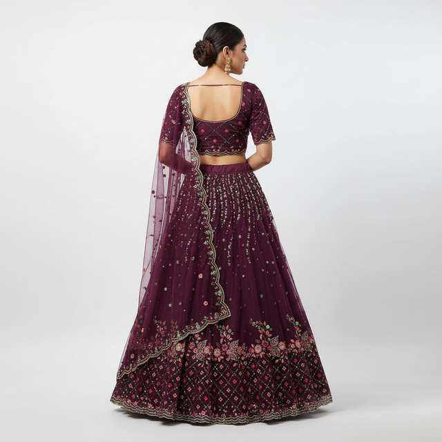 Wine maroon lehenga with sheer back dupatta, embroidered blouse back and flared skirt